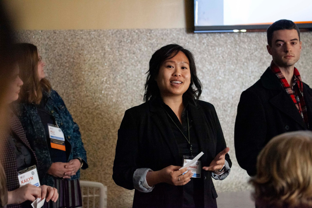Asian woman engaging in nonprofit professional development at a national conference