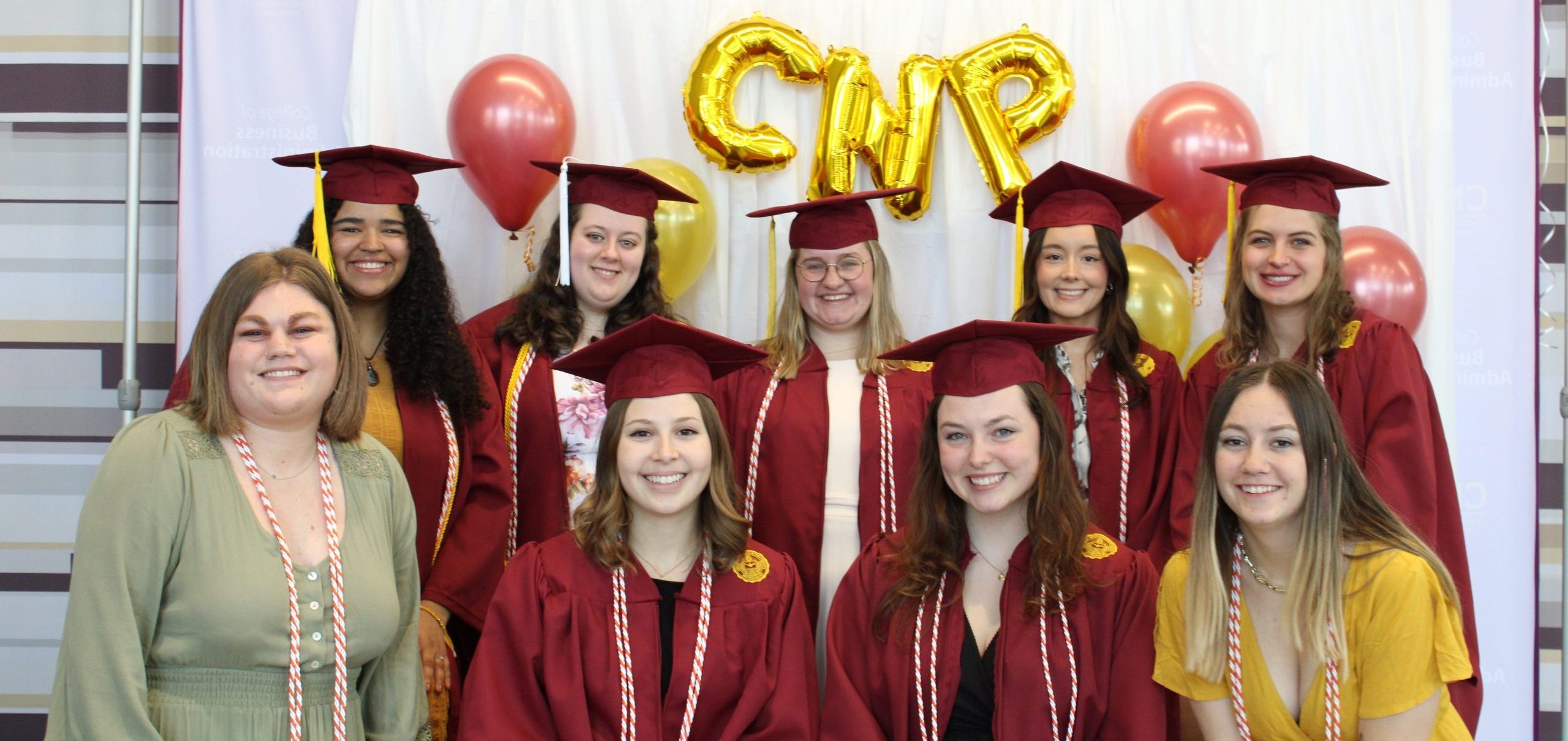 A group of nonprofit management students celebrating earning their CNP credential at Central Michigan University