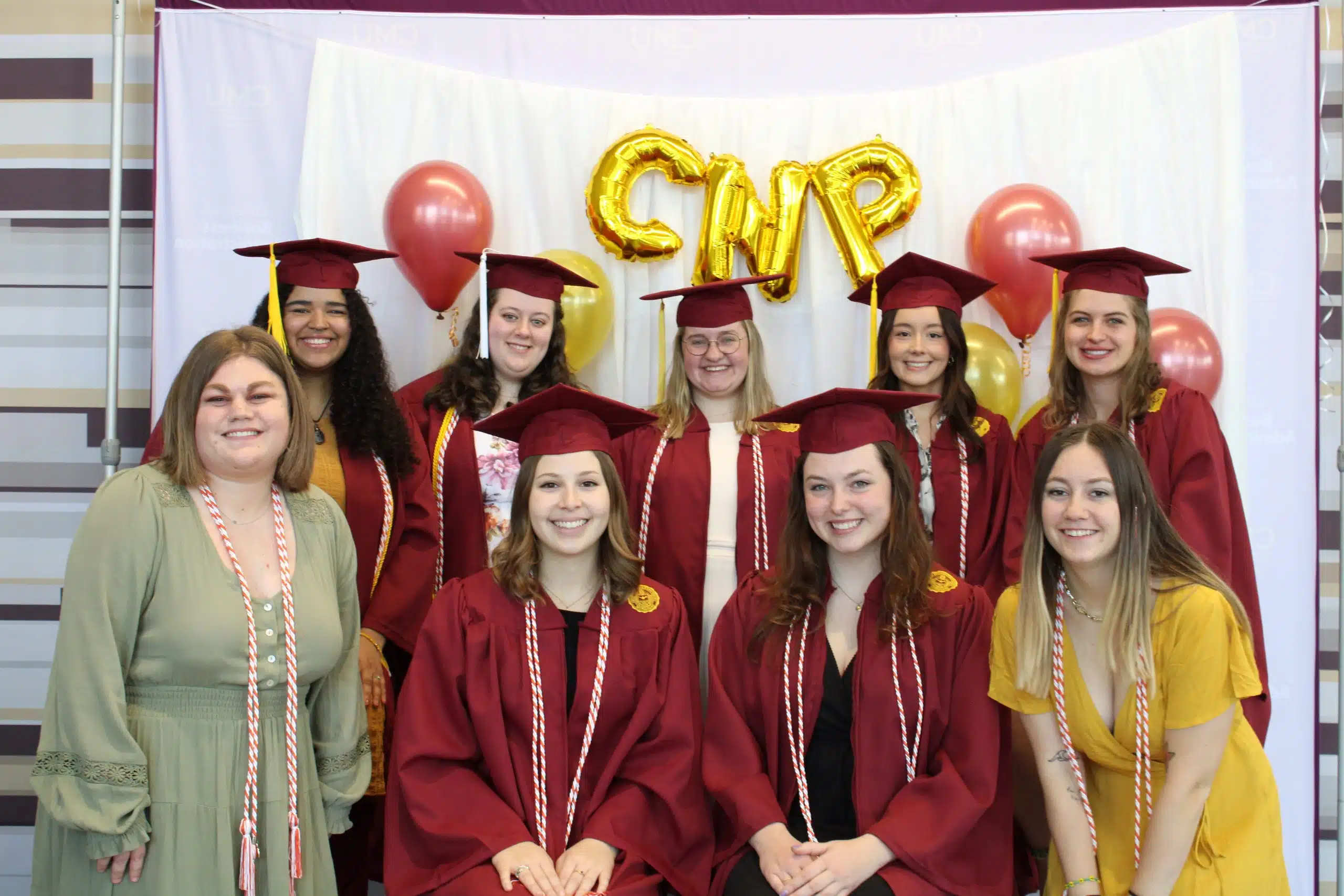 A group of nonprofit management students celebrating earning their CNP credential at Central Michigan University