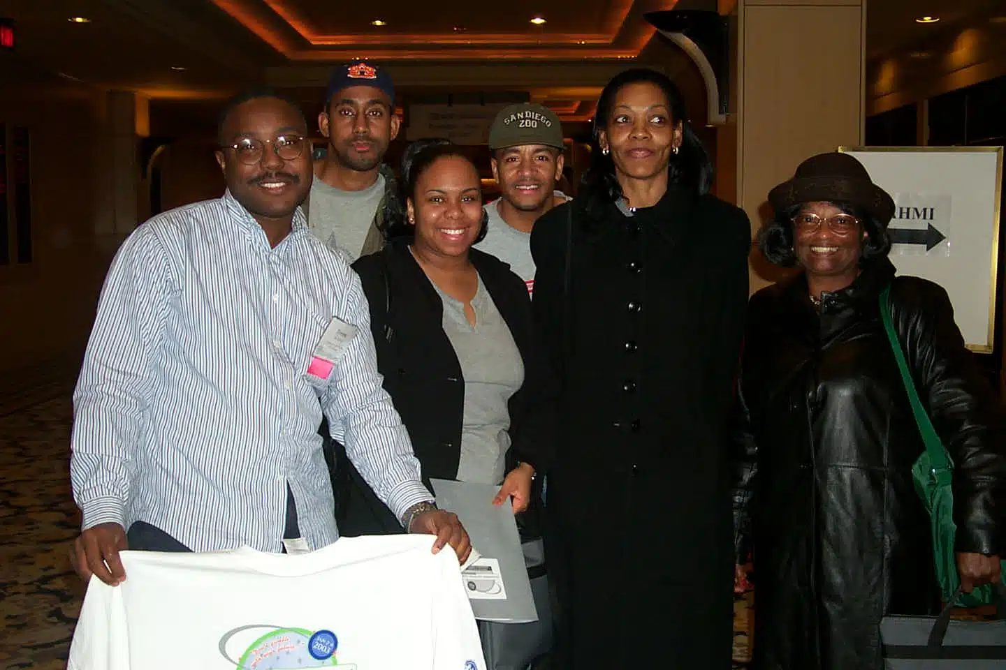 Large group of african american nonprofit professionals smiling together