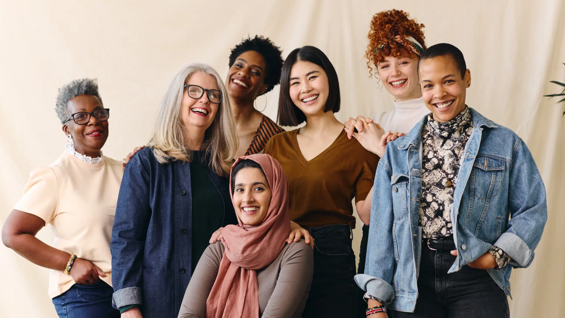 Group of nonprofit workers smiling together of different generations