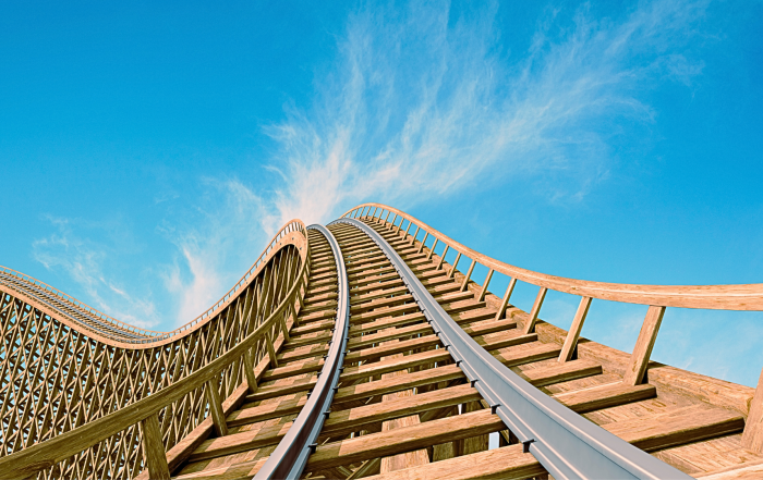 Roller Coaster about to go through twists and turns just like a nonprofit professionals going through the twists and turns of the sector